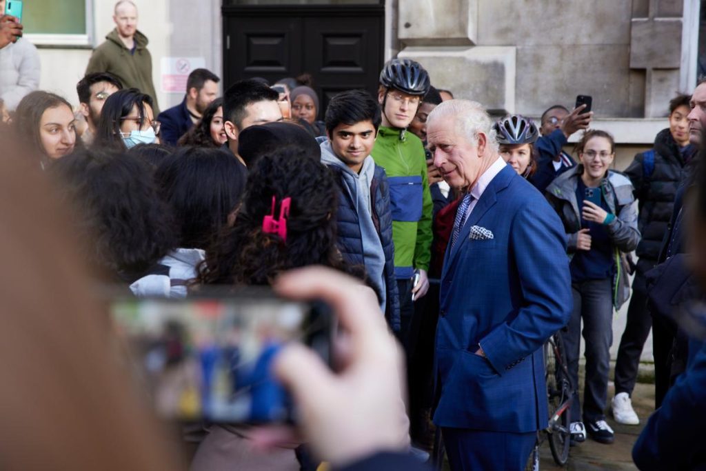 The King meets staff and patients in the hospital square